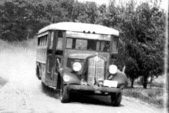 Picture of a school bus around 1930-1940.